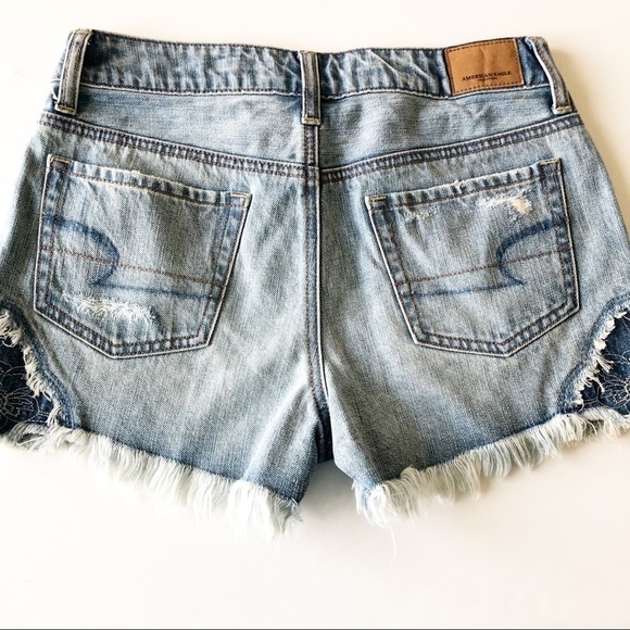 American Eagle Womens Medium Wash Embroidered Distressed Cutoffs Size 0 - Picture 9 of 11